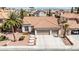 Aerial of a single-Gathering home with a terracotta roof and well-maintained landscaping at 8326 Mount Nido Dr, Las Vegas, NV 89147