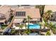 Lush backyard with covered patio, perfect for outdoor relaxation and entertaining at 8326 Mount Nido Dr, Las Vegas, NV 89147