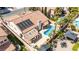 Private backyard oasis featuring a sparkling pool and lush landscaping, perfect for relaxation and entertaining at 8326 Mount Nido Dr, Las Vegas, NV 89147