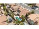 Enjoy the private backyard, featuring a sparkling swimming pool, patio, and outdoor seating areas for relaxation and entertainment at 8326 Mount Nido Dr, Las Vegas, NV 89147