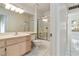 Bathroom with tile flooring, a toilet, vanity, and shower at 8326 Mount Nido Dr, Las Vegas, NV 89147