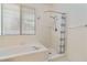 Bathroom featuring a bathtub and shower at 8326 Mount Nido Dr, Las Vegas, NV 89147
