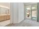 Bedroom with bathroom and pool views at 8326 Mount Nido Dr, Las Vegas, NV 89147