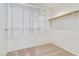 Walk-in closet with adjustable shelving and lighting at 8326 Mount Nido Dr, Las Vegas, NV 89147