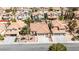 Attractive single-Gathering home with a two-car garage, mature palm trees, and well-maintained front yard at 8326 Mount Nido Dr, Las Vegas, NV 89147