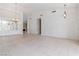 Bright, open living area featuring tile floors, recessed lighting and fireplace in the background at 8326 Mount Nido Dr, Las Vegas, NV 89147