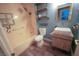 Modern bathroom with stylish vanity, vessel sink, and bathtub with shower at 9000 Litchfield Ave, Las Vegas, NV 89134
