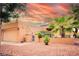 Charming single-story home featuring desert landscaping and a private courtyard entrance at 9000 Litchfield Ave, Las Vegas, NV 89134