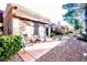 Inviting covered patio with ample seating and desert landscaping at 9000 Litchfield Ave, Las Vegas, NV 89134