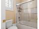 Clean bathroom with a glass shower enclosure and tiled walls at 10089 Clifton Forge Ave, Las Vegas, NV 89148