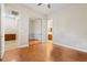 Spacious bedroom featuring hardwood floors and an ensuite bathroom at 10089 Clifton Forge Ave, Las Vegas, NV 89148