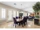 Elegant dining area with large mirror and natural light at 10089 Clifton Forge Ave, Las Vegas, NV 89148