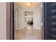 Inviting foyer with decorative marble inlay flooring, and views of the open floor plan at 10089 Clifton Forge Ave, Las Vegas, NV 89148