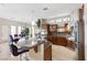 Modern kitchen featuring granite countertops, stainless steel appliances, and a center island at 10089 Clifton Forge Ave, Las Vegas, NV 89148