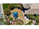 Aerial view of the community playground featuring colorful equipment and shaded seating areas at 10089 Clifton Forge Ave, Las Vegas, NV 89148