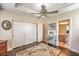 Bedroom with closet doors leading to ensuite bathroom at 10314 Premia Pl, Las Vegas, NV 89135