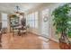 Charming breakfast nook with tiled floor, window shutters, and a decorative plant near the door at 10314 Premia Pl, Las Vegas, NV 89135