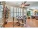 Breakfast nook with tiled floor, complemented by large windows and elegant furniture at 10314 Premia Pl, Las Vegas, NV 89135