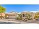 Attractive single-story home with desert landscaping, and a two-car garage in a well-kept neighborhood at 10314 Premia Pl, Las Vegas, NV 89135