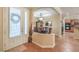 Welcoming foyer leading to an open-concept living area, dining area, and kitchen at 10314 Premia Pl, Las Vegas, NV 89135