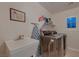 Spacious laundry room with modern washer and dryer, sink, and window for natural light at 11345 Espadrille Ct, Las Vegas, NV 89138