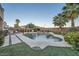 Serene backyard showcasing a stunning pool, spa, beautiful landscaping, and well-appointed outdoor amenities at 11345 Espadrille Ct, Las Vegas, NV 89138