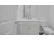 Close-up of the bathroom featuring a vanity, toilet, and modern finishes at 11617 Peregrine Point Ct, Las Vegas, NV 89138