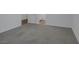 Neutral bedroom with soft carpeting and a door that allows access to other rooms at 11617 Peregrine Point Ct, Las Vegas, NV 89138