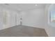 Neutral bedroom with a carpeted floor, white walls, and a window with blinds at 11617 Peregrine Point Ct, Las Vegas, NV 89138