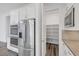 Well-equipped kitchen features stainless steel appliances, walk-in pantry, and sleek countertops at 11617 Peregrine Point Ct, Las Vegas, NV 89138