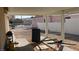 Covered patio area perfect for outdoor dining and entertaining with privacy fencing at 1214 Emerald Stone Ave, North Las Vegas, NV 89081