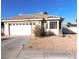 Beautiful home featuring a tile roof, two-car garage, and a bright bay window at 1214 Emerald Stone Ave, North Las Vegas, NV 89081