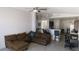 Comfortable living room featuring an open layout and access to the kitchen at 1214 Emerald Stone Ave, North Las Vegas, NV 89081