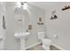 Bright bathroom with pedestal sink and modern fixtures at 1525 Spiced Wine Ave # 14105, Henderson, NV 89074