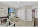 room with a comfortable sitting chair in front of the window and closet at 1525 Spiced Wine Ave # 14105, Henderson, NV 89074