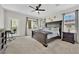 Spacious bedroom with a ceiling fan, natural light and exterior balcony access at 1525 Spiced Wine Ave # 14105, Henderson, NV 89074
