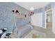 bedroom with teepee style bed frame and unique chandelier fixture at 1525 Spiced Wine Ave # 14105, Henderson, NV 89074