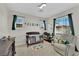 Charming bedroom featuring playful decor, crib, and comfortable chair at 1525 Spiced Wine Ave # 14105, Henderson, NV 89074