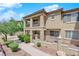 Multi-level townhome with private balconies and well-manicured landscaping at 1525 Spiced Wine Ave # 14105, Henderson, NV 89074