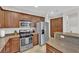 Modern kitchen with stainless steel appliances and ample cabinet space at 1525 Spiced Wine Ave # 14105, Henderson, NV 89074