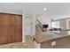Contemporary kitchen with granite counters and bar seating area at 1525 Spiced Wine Ave # 14105, Henderson, NV 89074