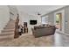 Spacious living room with a modern fireplace and tiled flooring at 1525 Spiced Wine Ave # 14105, Henderson, NV 89074