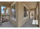 Covered patio featuring neutral color scheme and wrought iron guard railing at 1525 Spiced Wine Ave # 14105, Henderson, NV 89074