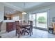 Dining area with sliding glass doors and views to the backyard at 1613 Williamsport St, Henderson, NV 89052