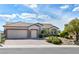 Lovely single-story home featuring desert landscaping and a convenient three-car garage at 1613 Williamsport St, Henderson, NV 89052