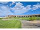 Golf course landscape with walking path and building in the background at 1613 Williamsport St, Henderson, NV 89052