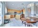 Bright kitchen featuring stainless appliances and dining area with backyard access at 1613 Williamsport St, Henderson, NV 89052