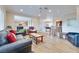 Open concept living room offers a view of the entryway and kitchen at 1613 Williamsport St, Henderson, NV 89052
