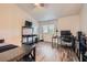 Bedroom setup with dark furnishings and accents, plus desk setup at 1672 Cloister Ave, Henderson, NV 89014