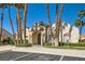 Exterior of community clubhouse with palm trees at 1672 Cloister Ave, Henderson, NV 89014